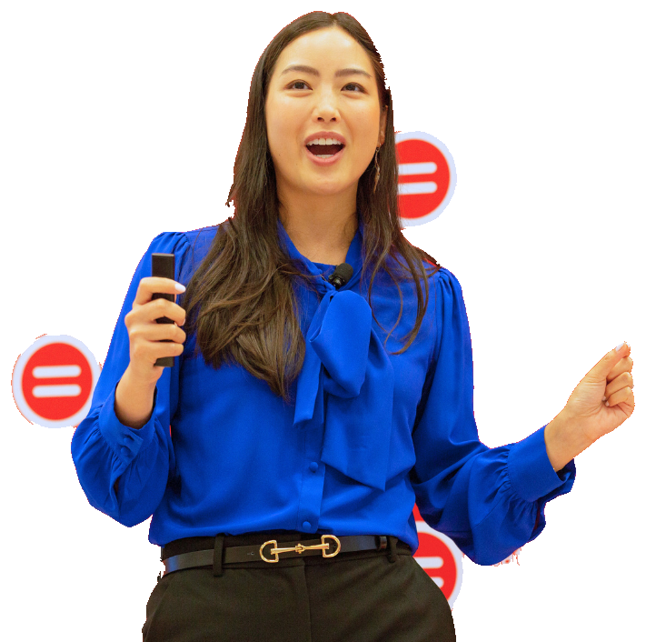 Lorraine K. Lee speaking on stage